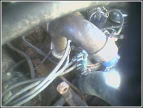1981 Ford Bronco - Close-up view of engine components and wiring, with a SuperMotors watermark.