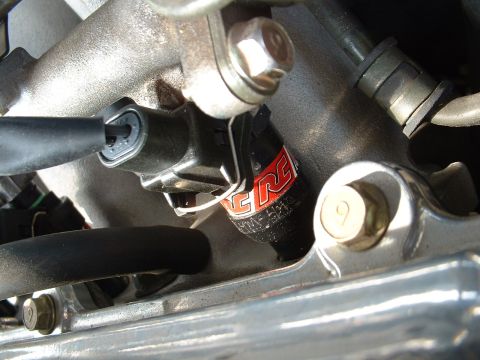 1996 Ford Probe - Engine component detail with visible 'ERC' branding and mounting hardware.