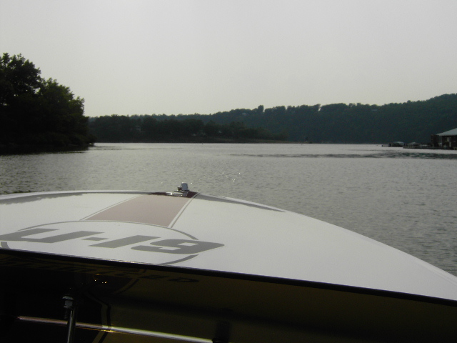 Boat deck with U-19 graphic on a lake