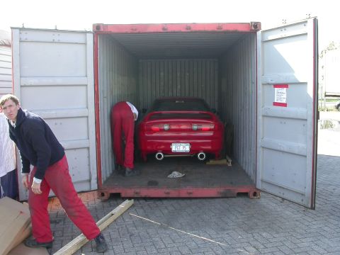 1995 Ford Probe - Some german guy preparing my car to be taken out of the container.