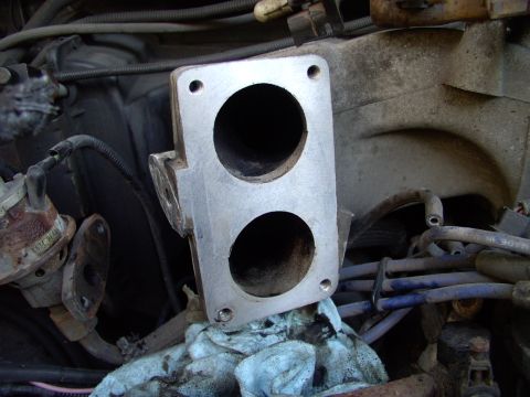 1986 Ford Bronco - There's the EGR hanging out of the way. I cleaned just around the mouth of the two throttle plenum openings and the EGR passageway in the i…
