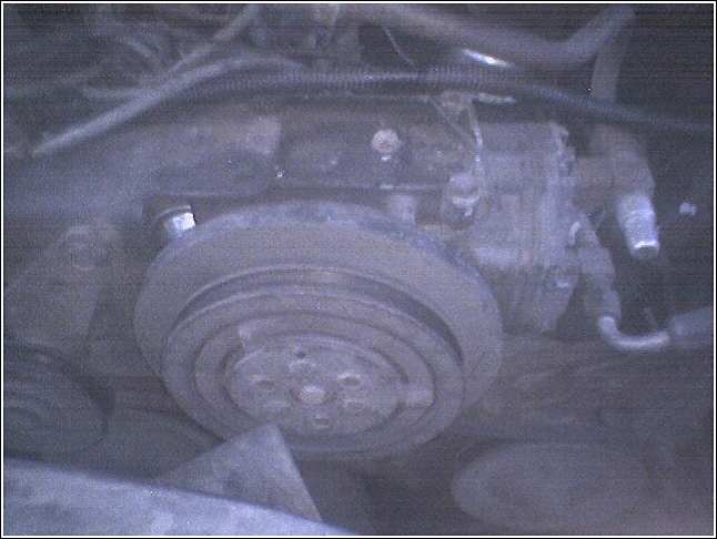 Engine compressor pulley and housing, dusty and metallic