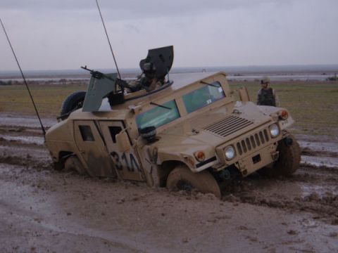 1979 Ford Bronco - My son sticking it in some serious mudd in Iraq