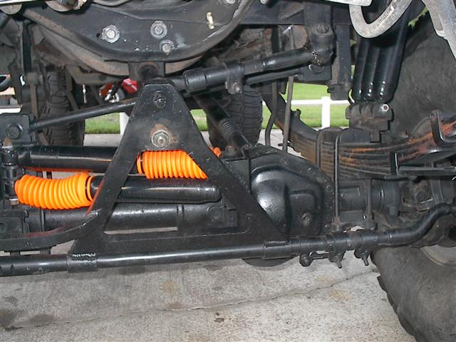 1997 Dodge 1500 front suspension with orange bellows on steering linkage