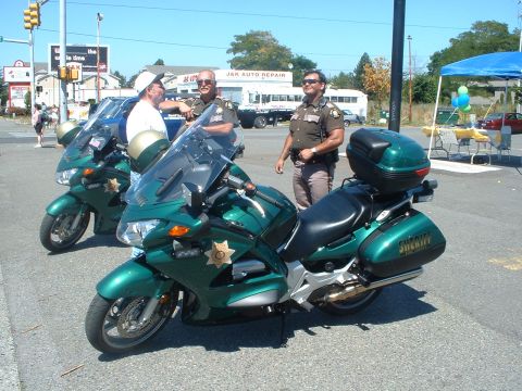 1999 Ford Crown Victoria - King County Sheriff's new Honda motorcycles.