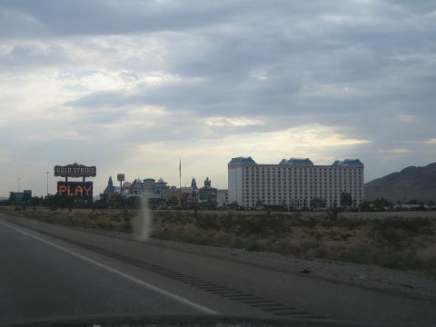 1985 Ford Mustang - The Gold Strike casino and hotel complex is visible from the highway, with a large sign indicating "Play".
