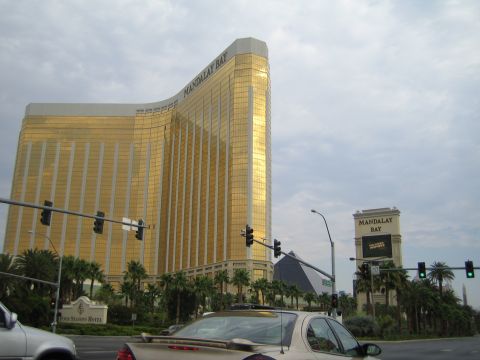 1985 Ford Mustang - A car drives past the iconic Mandalay Bay hotel in Las Vegas.