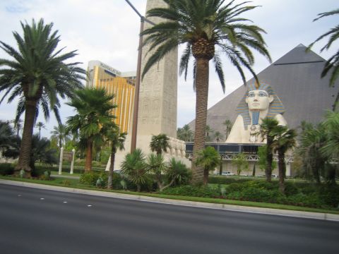1985 Ford Mustang - A view of the Las Vegas Strip shows the iconic Luxor Hotel pyramid and Sphinx, with the Mandalay Bay hotel in the distance.