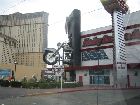 1985 Ford Mustang - A large motorcycle sculpture is mounted on the exterior of a Harley-Davidson store in Las Vegas.