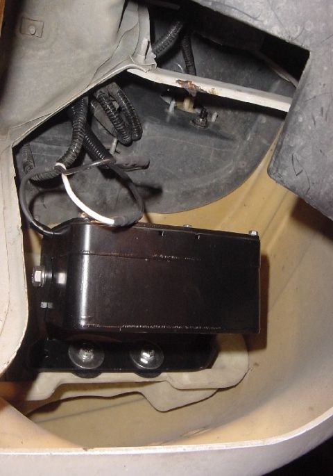 1993 Ford Mustang - Aftermarket electronic module and wiring installed in vehicle's bodywork.