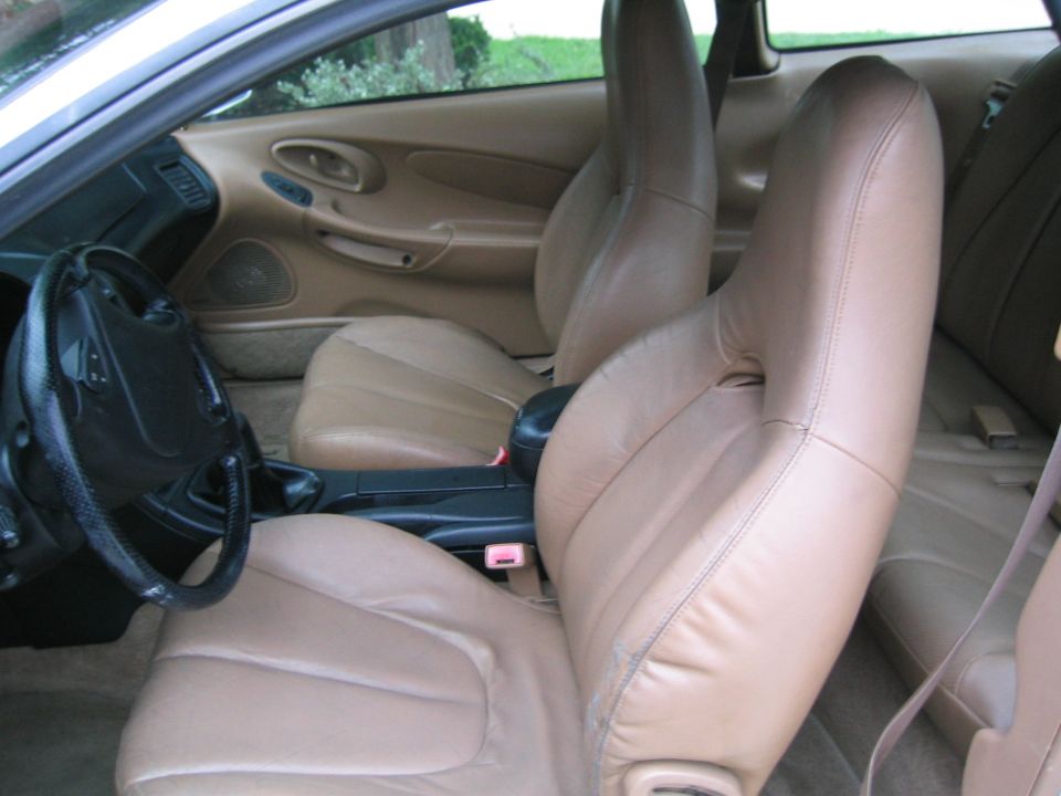 tan leather seats and dashboard of a car