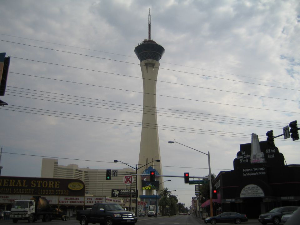 Stratosphere Tower and street scene in Las Vegas with multiple vehicles and buildings