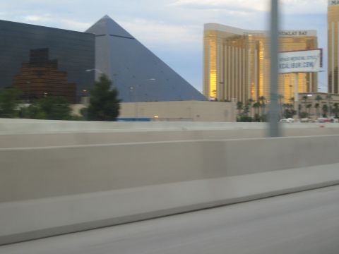1985 Ford Mustang - View of Las Vegas hotels from the highway, showing the Luxor and Mandalay Bay.