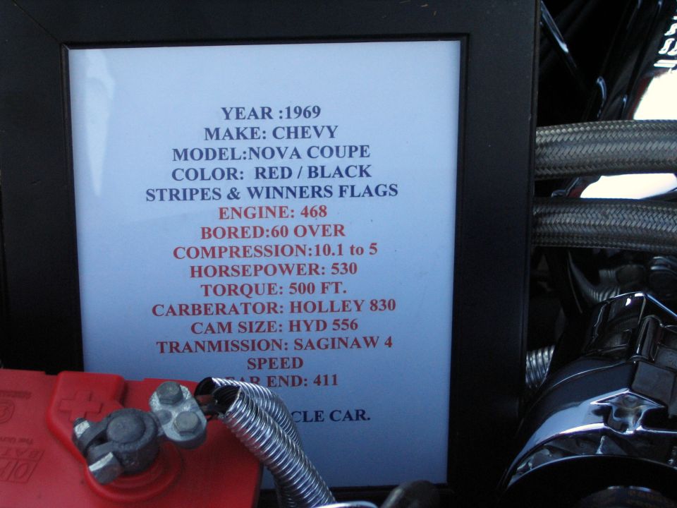 1969 Chevy Nova engine-bay build spec placard: 468 big-block, 530 hp, Holley 830