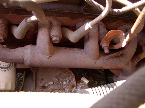 1990 Lincoln Town Car - This is supposedly the "good" header type 1990 manifolds on this Lincoln. Figure the aftermarket can improve on this no fear.