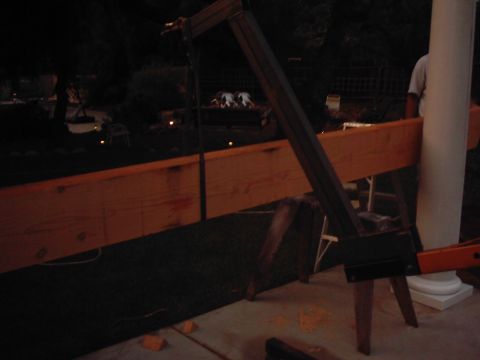 1978 Ford Bronco - Outdoor construction scene at night with lumber and a saw. Supermotors.net logo is present.