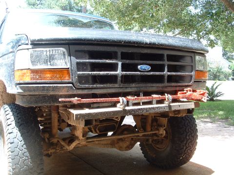 1993 Ford Bronco - Front view of a 1993 Ford Bronco, showing its grille and an aftermarket bumper modification.