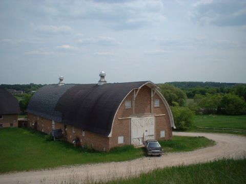 1984 Ford Crown Victoria LTD - In front of one of the barns of the Traverse City State Hospital. The barns were built just prior to the Depression.