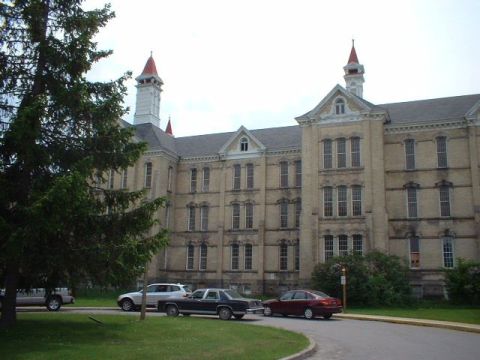 1984 Ford Crown Victoria LTD - In front of Building 50, the main building of the Traverse City State Hospital.