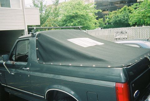 1990 Ford Bronco - Soft top after i installed correctly. Guy who installed screwed up 3 times drilled 3 sets of holes in THE WRONG SPOT! What a shmuck.
