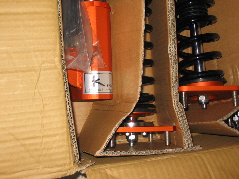 K-Sport coilover suspension parts in cardboard box