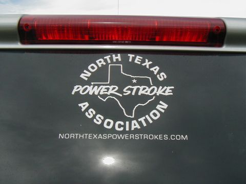 2002 Ford Excursion - A "North Texas Power Stroke Association" sticker is visible on the rear of a vehicle, along with the website northtexaspowerstrokes.com.