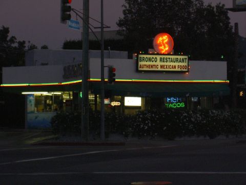 1988 Ford Bronco - Bronco Restaurant sign at night, advertising authentic Mexican food and fish tacos.