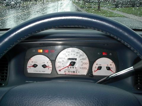 1985 Mercury Grand Marquis - The dashboard of a Mercury Grand Marquis displays its gauges and odometer reading 2000 miles.
