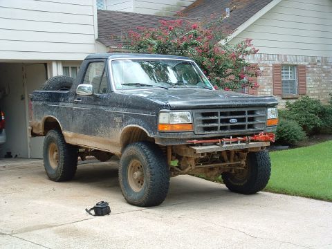 1993 Ford Bronco - This 1993 Ford Bronco features a lifted suspension and large off-road tires, ready for adventure.
