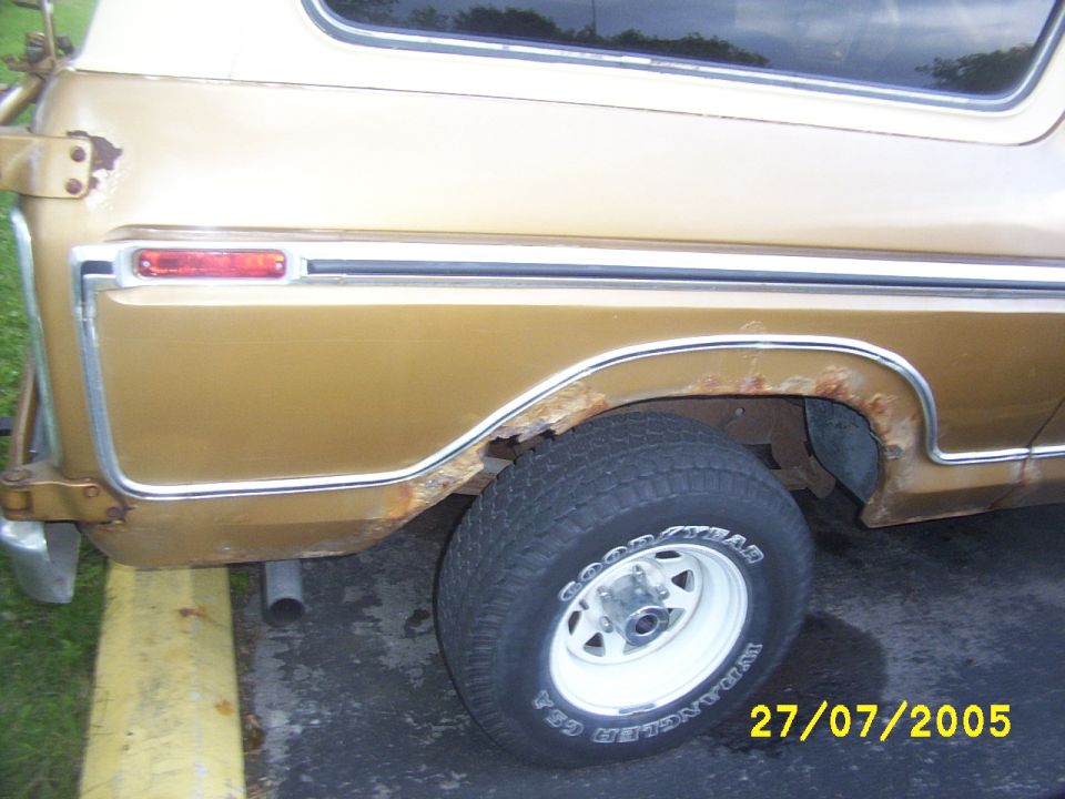 Passenger side Quarter Panel, badly rusted.
