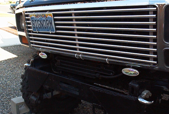 Black Ford Bronco front grille with chrome bars and Nevada license plate reading BIGNORM