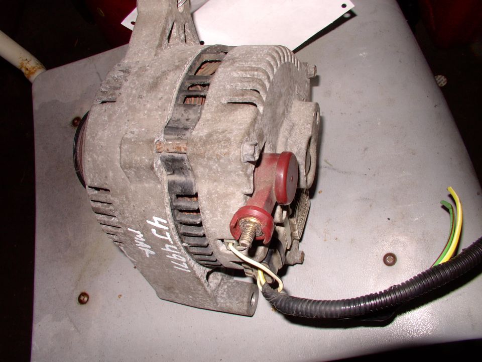 Straight from the junkyard. $60 Canadian for this 3G 130 amp unit off a wrecked 95 Windstar.  The redish plastic cap can be taken right off to reveal a stud.