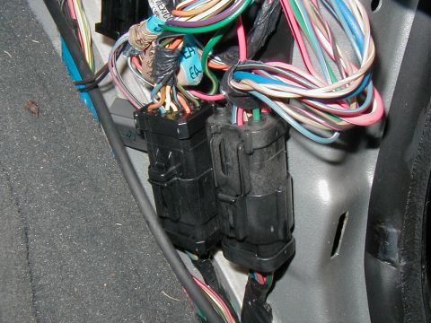 2002 Ford Excursion - Vehicle wiring harness and connectors are visible in this close-up shot.