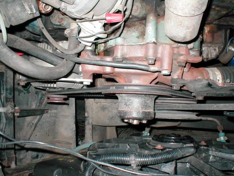 1979 Ford Bronco - Close-up view of the engine bay, focusing on the belts and pulleys.