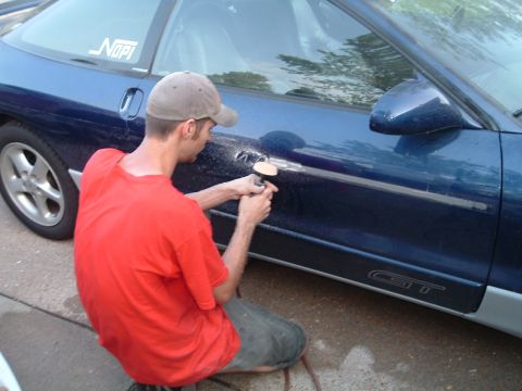 1994 Ford Probe - David using an eraser air-tool to get the adhesive from the door-ding-guards off
