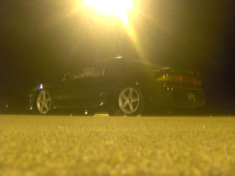 1994 Ford Probe - This 1994 Ford Probe is parked under a bright light at night, showing its rear quarter profile.