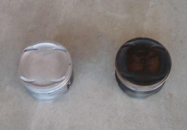 two pistons, one clean and one dirty