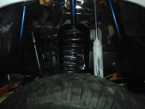 1978 Ford Bronco - Suspension components including a coil spring and shock absorber are visible.