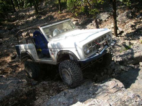 1995 Ford Bronco - This classic Ford Bronco is tackling a challenging off-road course.