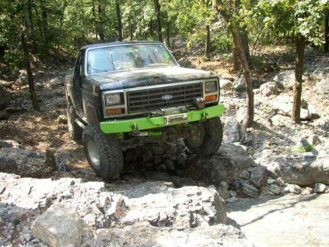 1995 Ford Bronco - This modified Ford Bronco navigates a challenging rocky trail.