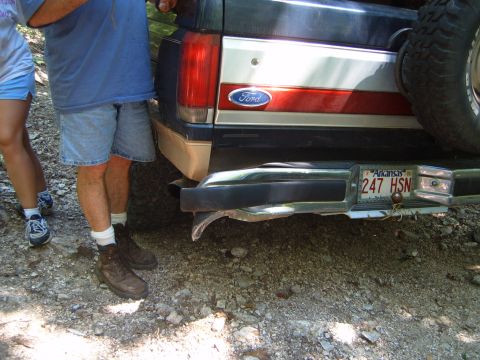 1988 Ford Bronco - The rear of a Ford Bronco is shown, a chrome bumper and a spare tire. The license plate is from Arkansas.