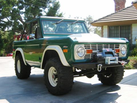 1985 Ford Bronco - This 1973 Ford Bronco features a two-tone paint scheme and a winch mounted on the front bumper.