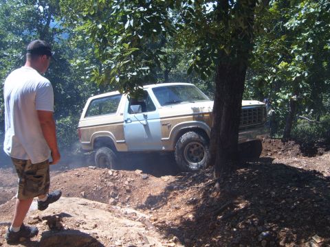 1988 Ford Bronco - This 1980s Ford Bronco navigates a challenging off-road course.