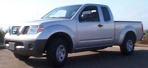 2005 Nissan Frontier - This silver 2005 Nissan Frontier pickup truck is shown from a 3q front angle.