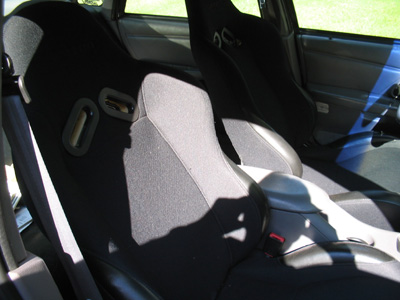1995 Ford Taurus - Custom racing seats and center console are visible in this interior shot.
