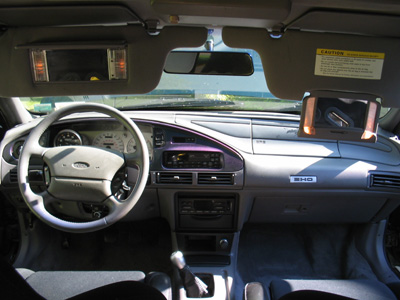 1995 Ford Taurus - Interior view of a 1995 Ford Taurus, highlighting the dashboard and controls.