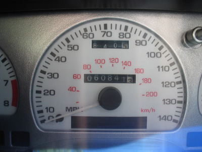 1995 Ford Taurus - The odometer reads 60,841 miles on this vehicle's dashboard.
