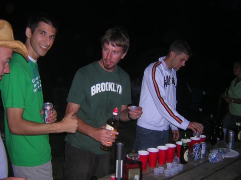 1995 Ford Probe - A group of friends appears to be enjoying drinks at an outdoor gathering.