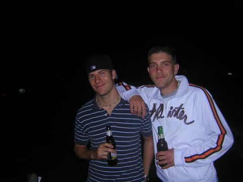 1995 Ford Probe - Two men are pictured outdoors at night, holding beer bottles.