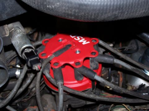 1986 Ford Bronco - Cap with secondary plug retainer.